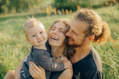 a happy couple with a baby