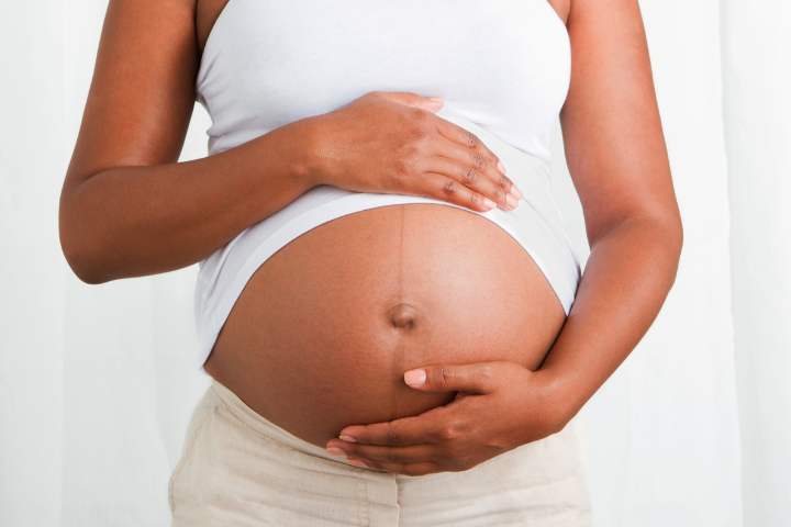 Close-up of a pregnant woman's belly