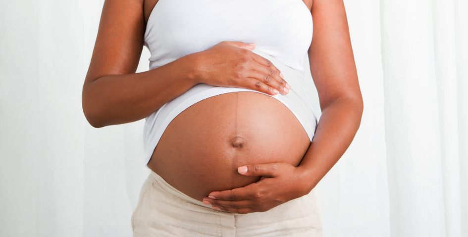 Close-up of a pregnant woman's belly