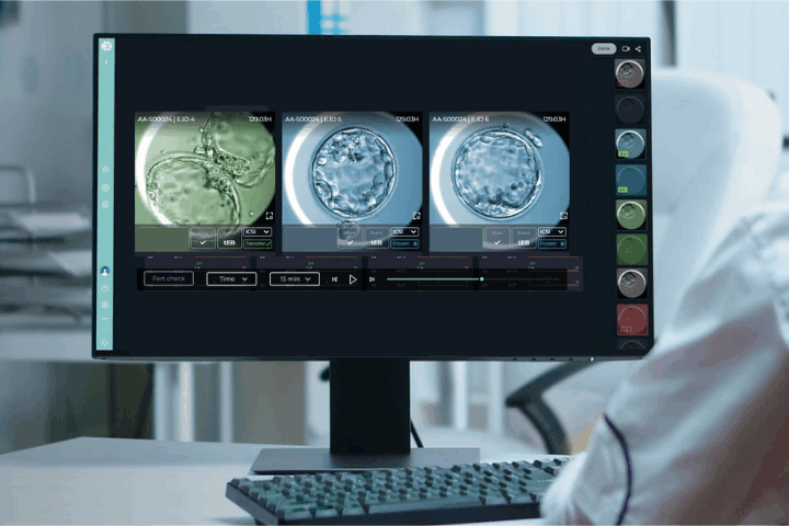 An embryologist views multiple embryos while using CHLOE's embryo selection technology.